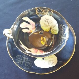 Elegant Black and Gold Floral Teacup and Saucer Set